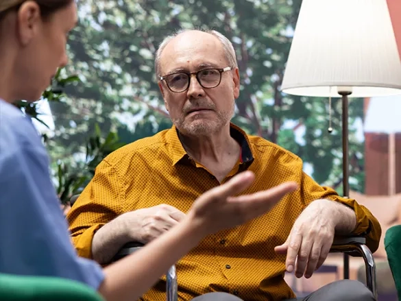 Man talking to professional