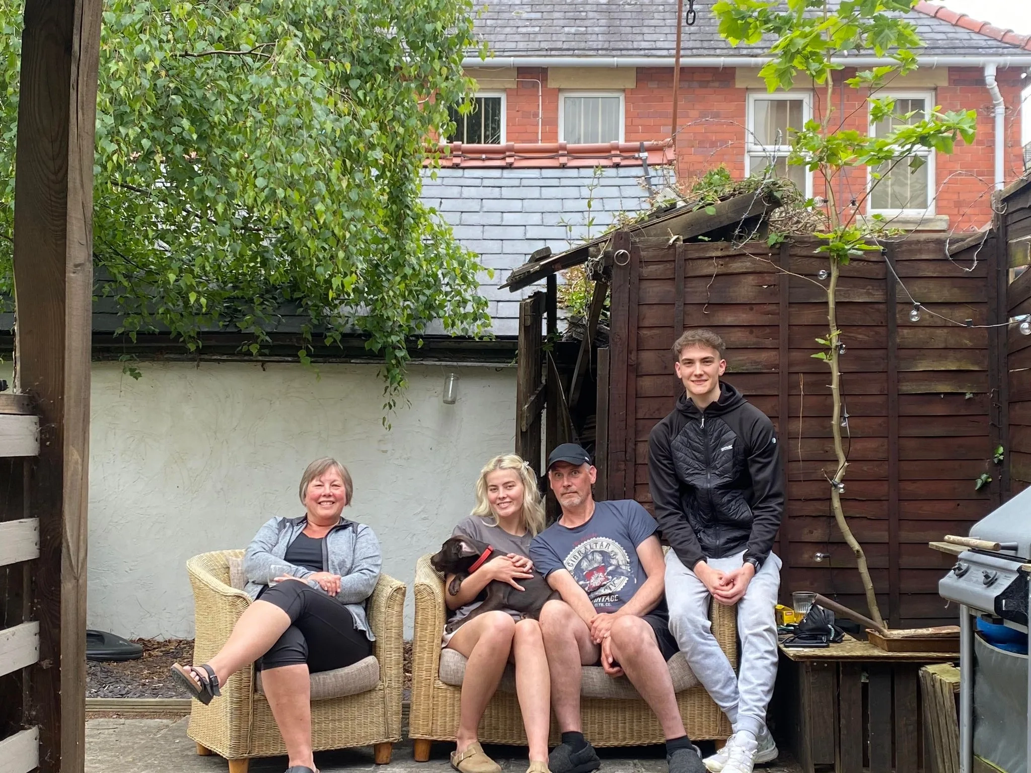 Tracy, Dave and family with puppy